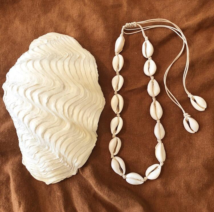 Choker crafted with white cowrie shells